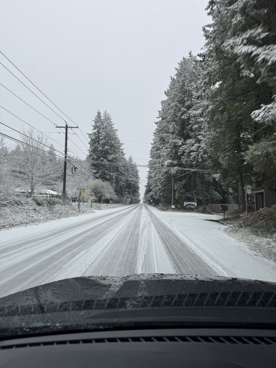 AndrewPadula's tweet photo. Roads are very slick in Kitsap County. Silverdale and Poulsbo are covered in snow. Big rigs are having to chain up. https://t.co/osQD5PGrpL