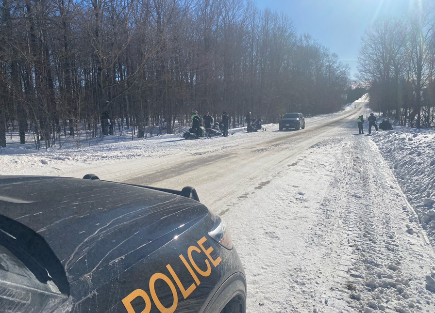 OPP_WR's tweet photo. #HuronOPP officers were checking snowmobiles and their operators on Clegg Line in #Northhuron this past weekend. 40 individuals were checked with everyone in compliance. #OFSC trails have been busy in #huroncounty this winter. Please continue to drive safe, drive sober and prepare for any situation. #OPP #snowmobile #RIDE #ArriveAlive @maddcanada ^cs.