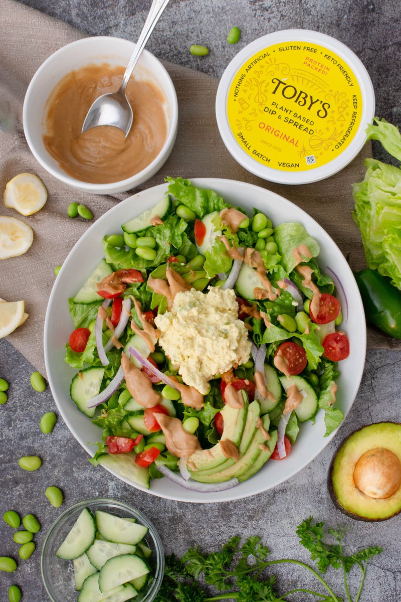 TobysFoods's tweet photo. This Peanut Sauce Edamame Salad serves up next-level flavors with fresh romaine, cucumber, edamame, and cherry tomatoes—plus homemade peanut sauce and a scoop of Toby’s Original Dip to round it all out! 🤩 https://t.co/4E9SK5uZMY