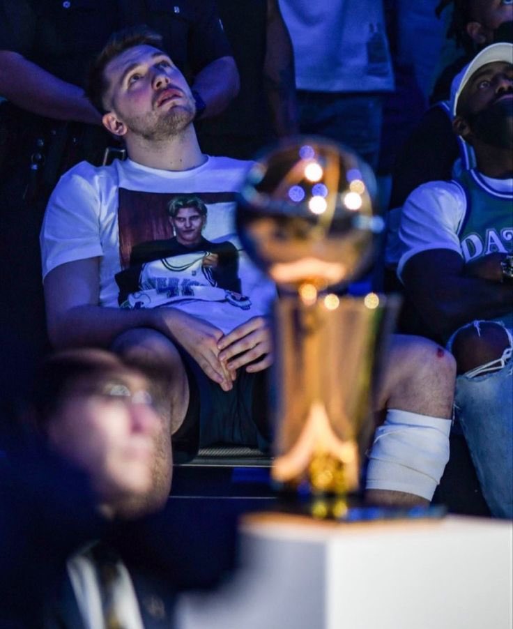DickCarlisle's tweet photo. Now, we will never see Luka get his chance to fulfill his destiny as the heir apparent to Dirk’s legacy. And this is the single saddest photo in DFW sports history. It doesn’t matter what success the Mavs have going forward. 

We will ALWAYS be asking “What If?” https://t.co/uZAv6wgw2D