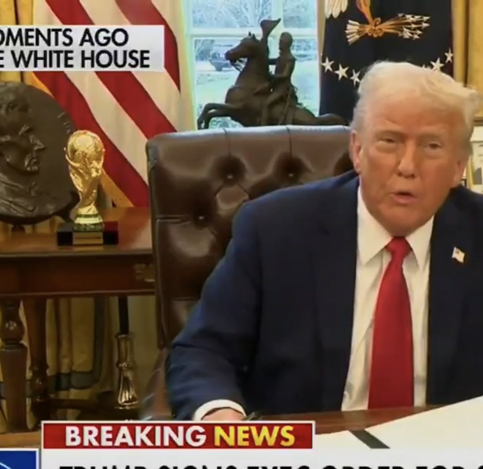 Trump has a…….World Cup…..on his desk?!