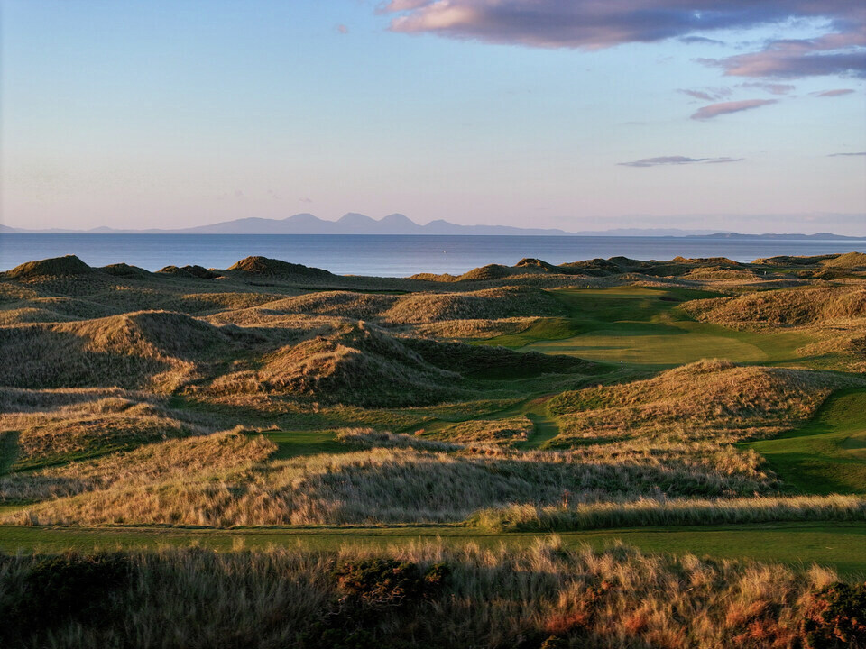 This is Machrihanish Golf Club, a true links masterpiece designed by Old Tom Morris. The Atlantic Ocean and the majestic Paps of Jura form an unforgettable backdrop. 

If you haven't explored this corner of Scotland, you're missing out.