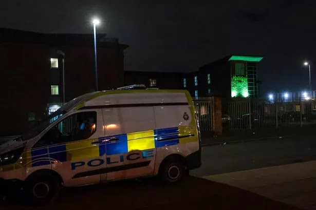 ActivePatriotUK's tweet photo. 🚨 ILLEGAL IMMIGRANT sets himself on FIRE at the Holiday Inn in MANCHESTER

A huge emergency response was called to a hotel in Manchester on Monday afternoon (February 3) following a serious incident.

Police, paramedics and fire crews were called to a concern for welfare report at the Holiday Inn, which houses asylum seekers, on Oldham Road near to Newton Heath at around 4.30pm.

A man, whose age was not confirmed, was taken to hospital from the scene after a fire was reportedly started in one of the rooms. His condition is understood to not be described as life-threatening or life-changing.

Fire crews also attended the incident to distinguish the blaze on Monday afternoon. Witnesses reported seeing multiple police and ambulance vehicles in attendance.

The Manchester Evening News understands that a man had attempted to set himself on fire at the hotel before emergency crews arrived.

A Greater Manchester Police spokesperson said in a statement: "At around 4.30pm today (Monday 3 February 2025), we were called to a reports that a business premises was on fire on Oldham Street in north Manchester. No arrests have been made and enquiries are ongoing

A spokesperson for Greater Manchester Fire and Rescue Service (GMFRS) said: “Shortly before 4.10pm today (Monday 3 February), four fire engines from Manchester Central, Phillips Park and Gorton fire stations were called to attend a commercial building fire on Oldham Road, Manchester.

“Crews arrived quickly and used two hose reels, four breathing apparatus, a thermal imaging camera and a gas detector to extinguish the fire. Firefighters remain in attendance and are working alongside colleagues from Greater Manchester Police to make the area safe.”