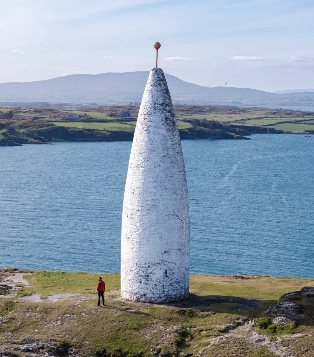 The Baltimore Beacon, also known as Lot's Wife, is a well-known maritime navigational aid located at the entrance to Baltimore Harbour in West Cork, Ireland. It stands on a high cliff overlooking the Atlantic Ocean, marking the southern entrance to the harbour and serving as a