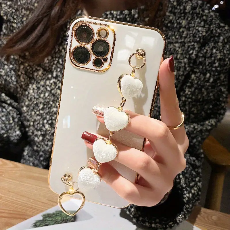 DigiiVault's tweet image. Style meets protection with the Luxury Plating Heart Metal Bracelet Phone Case! 💖📱 Designed for iPhone 14, 13, 12, 11 &amp;amp; more, it features a chic bracelet chain &amp;amp; lens protection for elegance &amp;amp; durability. ✨💎 #LuxuryCase #ChicStyle #iPhoneAccessories #PhoneProtection