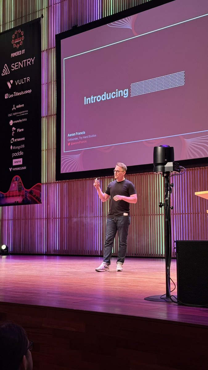 "Introducing [REDACTED]: a new paradigm for Laravel + Javascript” 👀 What is <a href="/aarondfrancis/">Aaron Francis</a> cooking? Now on #LaraconEU stage!