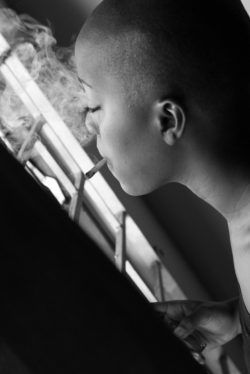 LMPhotographyJA's tweet photo. A moment of reflection—smoke, light, and the quiet thoughts that drift between. #BlackAndWhite #Photography #MoodyVibes #LMPhotoJa https://t.co/HvrHXuTCRC