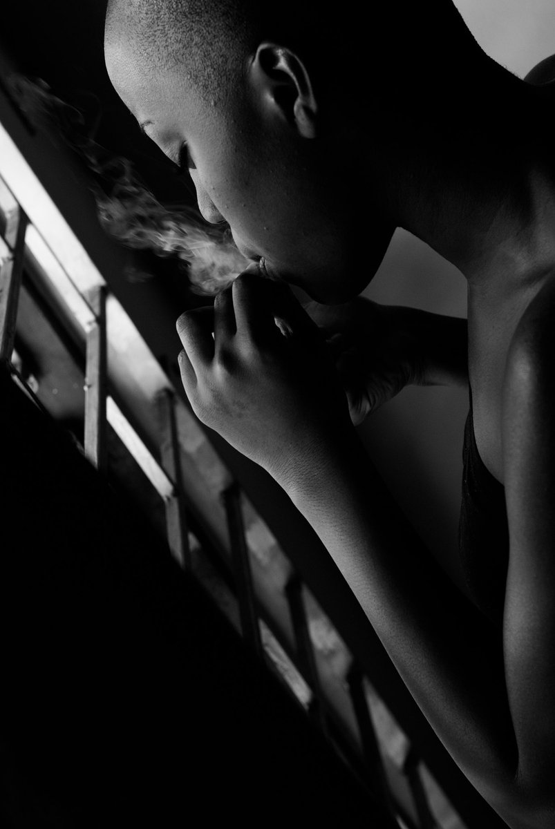 LMPhotographyJA's tweet photo. A moment of reflection—smoke, light, and the quiet thoughts that drift between. #BlackAndWhite #Photography #MoodyVibes #LMPhotoJa https://t.co/HvrHXuTCRC