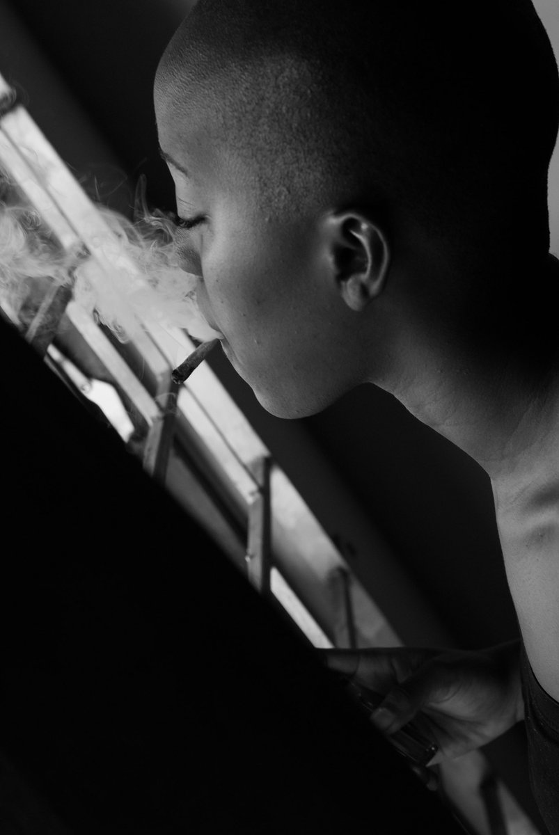 LMPhotographyJA's tweet photo. A moment of reflection—smoke, light, and the quiet thoughts that drift between. #BlackAndWhite #Photography #MoodyVibes #LMPhotoJa https://t.co/HvrHXuTCRC