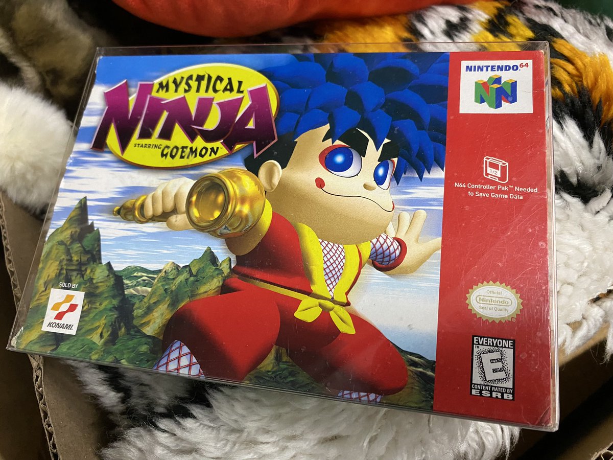 TheNintendoFeed's tweet photo. Mystical Ninja Starring Goemon on Nintendo 64 - COMPLETE IN BOX - MINT CONDITION! The Nintendo 64 Box has a plastic protector around it. This game as a CIB sells up to $425+. I’d take $350 and offer FREE SHIPPING! This would change my life majorly right now. Tons for sale! https://t.co/NuuiVoxv7E
