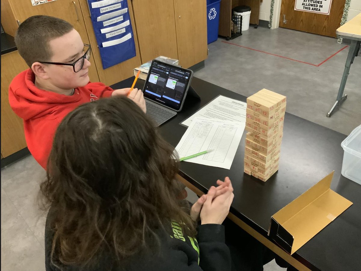 8th grade science students are learning about genetics and heredity. They played Jenga to simulate the ups and downs of mutations to learn how some mutations to an organism's DNA can be helpful, harmful or neutral.