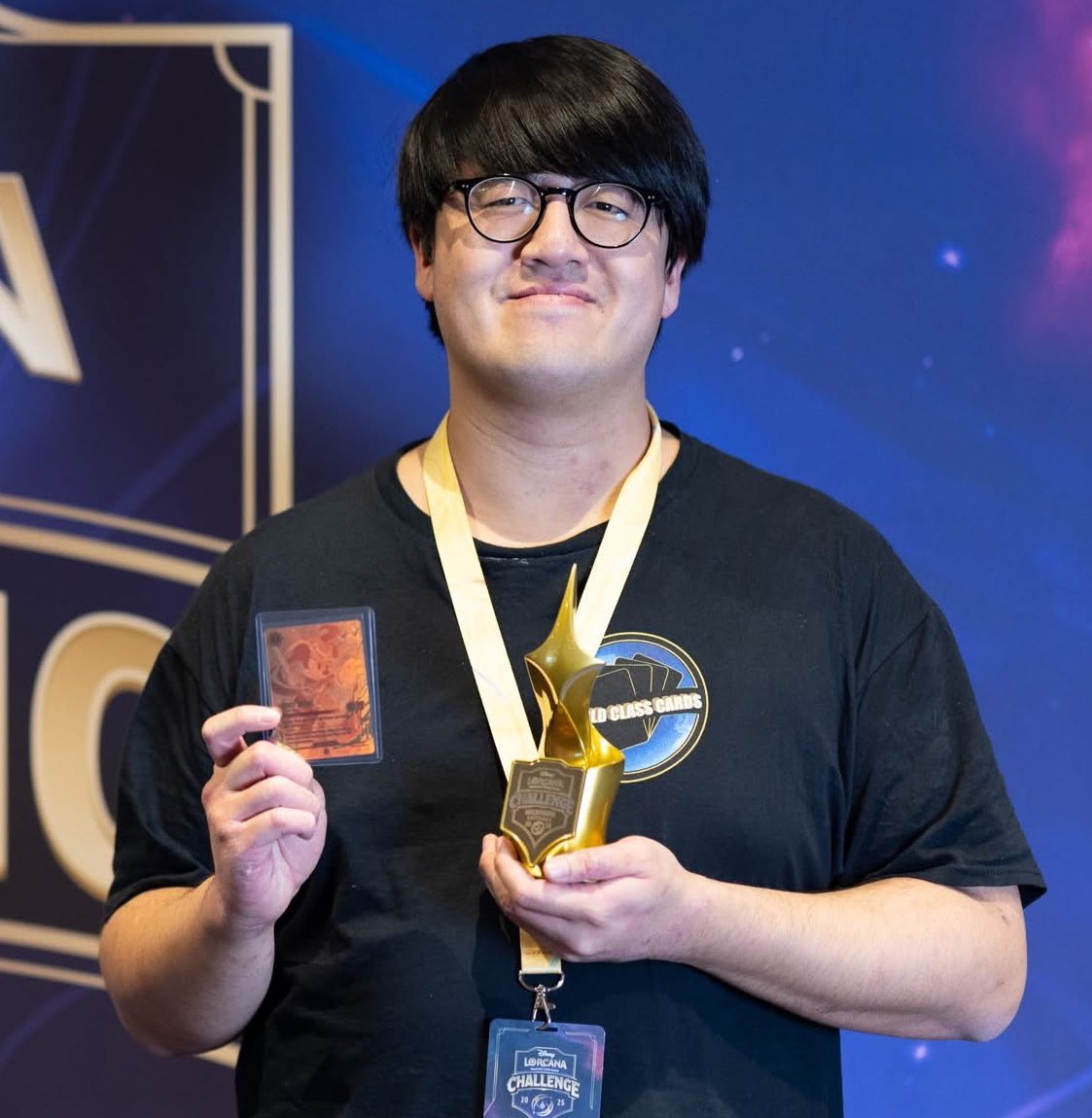 DinhKhangPham's tweet photo. DLC Melbourne - My Journey 🏆
(1/3 🧵)

My dream was always to win a major event in a TCG and show my mum the trophy. Unfortunately only half of that dream was fulfilled, but I stand proud and happy! Thank you for everything! ❤️

Roughly 8 months ago I’ve started my Lorcana Journey. Many of you followed me through the ups and downs, the wins and the losses and now the stars finally aligned! 
I‘m proud to say, that I‘m one of the first DLC Champions of the first season of Lorcana! 
This event was the most fun I‘ve ever had and I hope you saw it on my face! ❤️

„Dinh a Little Lore“

Ruby Sapphire was and still is the deck that I love the most out of EVERY TCG!
It was coincidence that I started Lorcana with this deck, but I‘m so happy that it happened!
Over the time I adjusted Ruby Sapphire again and again, developed different gameplans to attack the meta, trying to give myself an edge.
When Set 6 was revealed I couldn‘t believe they gave us Sail the Azurite Sea. At that time Maui Half Shark was still underestimated or rather underutilized. S4ilor had a good approach with the additional songs and I tested Vitalisphere combos.
Ultimately I realized that the power of Shark lies in the Lore Gain and the difficulty of removing him. That means if you fully commit the deck to Half Shark, you might have a decent strategy.
At the Axiom Events in Birmingham (23th Nov 2024) I tested my new found Shark Burn deck. I ran Super Goofs, Shark and A pirate‘s Life as 4of to counter the uprising of Emerald Amethyst. It worked pretty well, but there were still weaknesses. 
In hindsight mixing Control RB and the fast approach didn‘t run smoothly, but I would need a while to realize that.
For EU continentals I decided to run a mix of both worlds, running a faster RB but with Tamatoas as Topend. Unfortunately I misplayed against AS, which costed me win and in. But I also realized that the build was missing something. When the Ruby decks used Be Prepared I had not much to recover.
The french players decided to run McDuck Manor and Reece was also on it (1st Place after swiss).
I wish I had the courage to put them in on the Friday before. 
At the Sunday revival I‘ve decided to finally cut Iceblocks and leave Hiram hanging on 4 Items and to include McDuck Manor and my Goofs, that I replaced with QoH prior, which was a huge mistake.
Quickly I found out that the Ruby players I faced were completely overwhelmed by Half Sharks followed by McDuck Manor. This gave me the confidence to try this deck again for NA continentals.

I went home and immediately started testing and theorycrafting for hours and hours. While testing I noted EVERYTHING down, so I could analyze my games after a while. That gave me a lot of data to work with!
For example, I realized that I inked Tamatoa most of the time and that my winrate wasn‘t impacted by him most of the time. So I finally got convinced that he wasn‘t worth the slot.
After I‘ve found a build that I liked, the true grind began. 
What lines exist? What about the mulligan? What if xyz happens, how do I react? When should I ink what, when should I stop inking?
After roughly 450 matches and a huge amount of notes I came down to my NA list, which was only 2 cards different from my current version: 2 Sisu vs 3rd Hiram, 3rd Tala.
At the NA continentals my deck ran so well until I faced Mo. I don‘t know why I didn‘t do my lines as I planned and it ruined my run. Mo played well and he deserved the win!
But it was also the time I noticed something. The 2 Sisu were too expensive. How could I overlook this simple fact?
Going over 6-7 ink fast is not always given with this deck and I never summoned Sisu the entire tournament besides one time just because I had nothing else to do. And now against Mo she clogged my hand, I needed that extra ink.
This was the time I realized how much „old knowledge“ held me back.