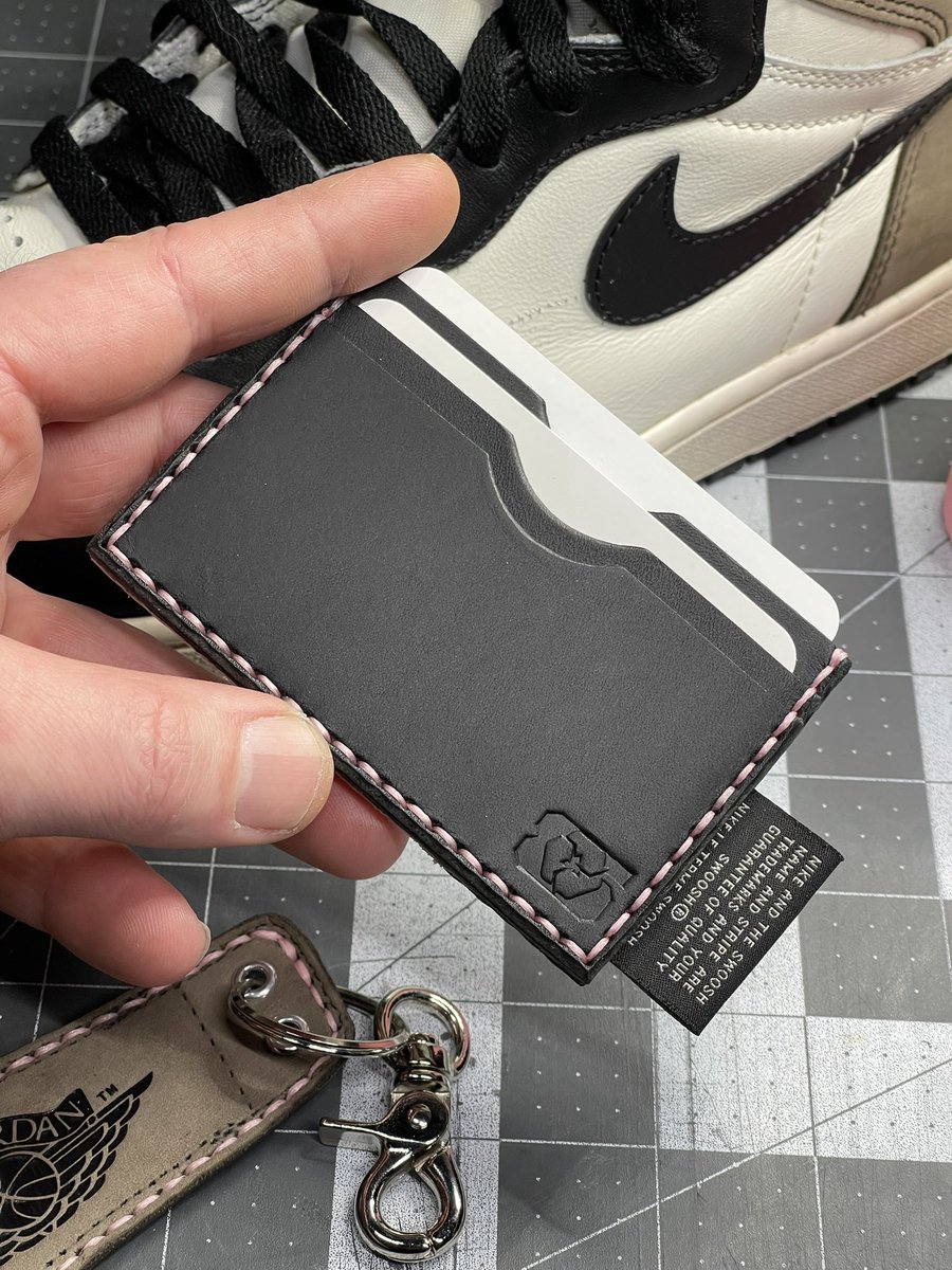 85customs's tweet photo. Old kicks. New life.♻️ 

Upcycled Jordan 1 High Dark Mocha 2020 cardholder wallet and wings keychain. 

I repurpose worn out or damaged sneakers to create my hand stitched leather goods and upcycled sneaker art. https://t.co/HFAOqnC7sU