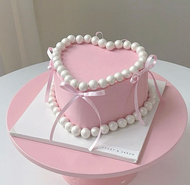 Pink heart shaped cake by heart_n_arrow
