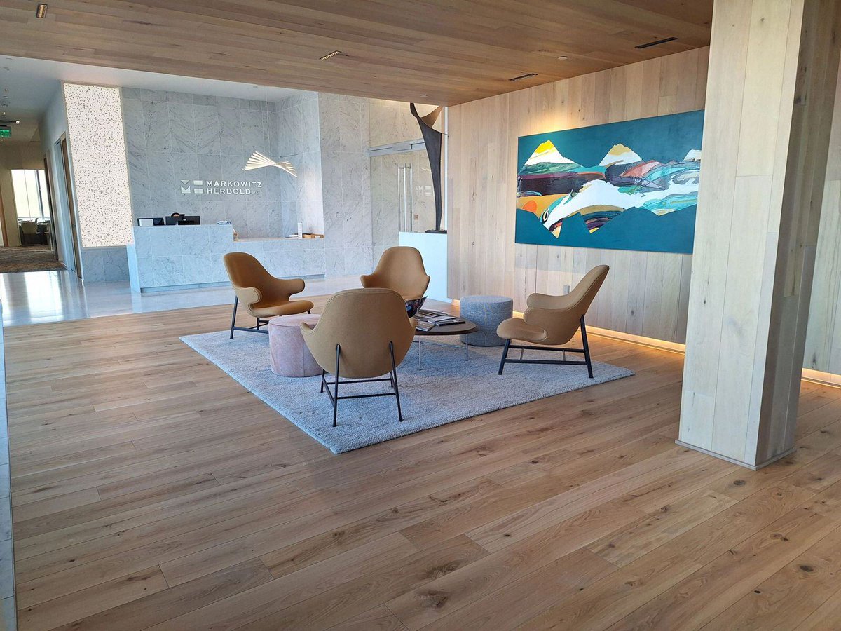 A cohesive design from floor to ceiling. A custom version of our Paradise Matte was crafted in a specific width to ensure a seamless transition between the flooring, walls, and ceiling of this professional office in downtown Portland.