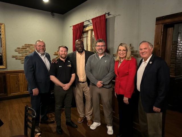 Several area leaders stopped by on Monday night to welcome AHSAA Executive Director, Heath Harmon, to Mobile and to thank him and the AHSAA for awarding Mobile the Super 7 Football Championships in 2026 and 2028. Coach Harmon was in town for the AHSAA State Bowling Championships.