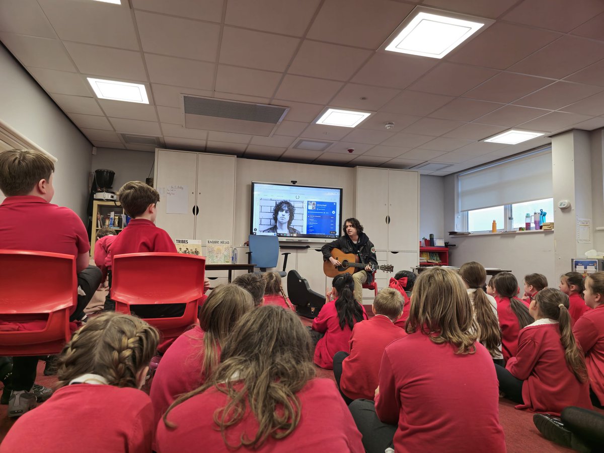 AshKnotty's tweet photo. Y5 and 6 have been so lucky and were visited by #JohnnyLloyd on part of his Punchline tour! We have loved his music this year and really enjoyed the new album! We are so grateful to Johnny for stopping in before his performance at the @thejacclub ! @tribesband #MusicalHero https://t.co/0td31Z3uRU