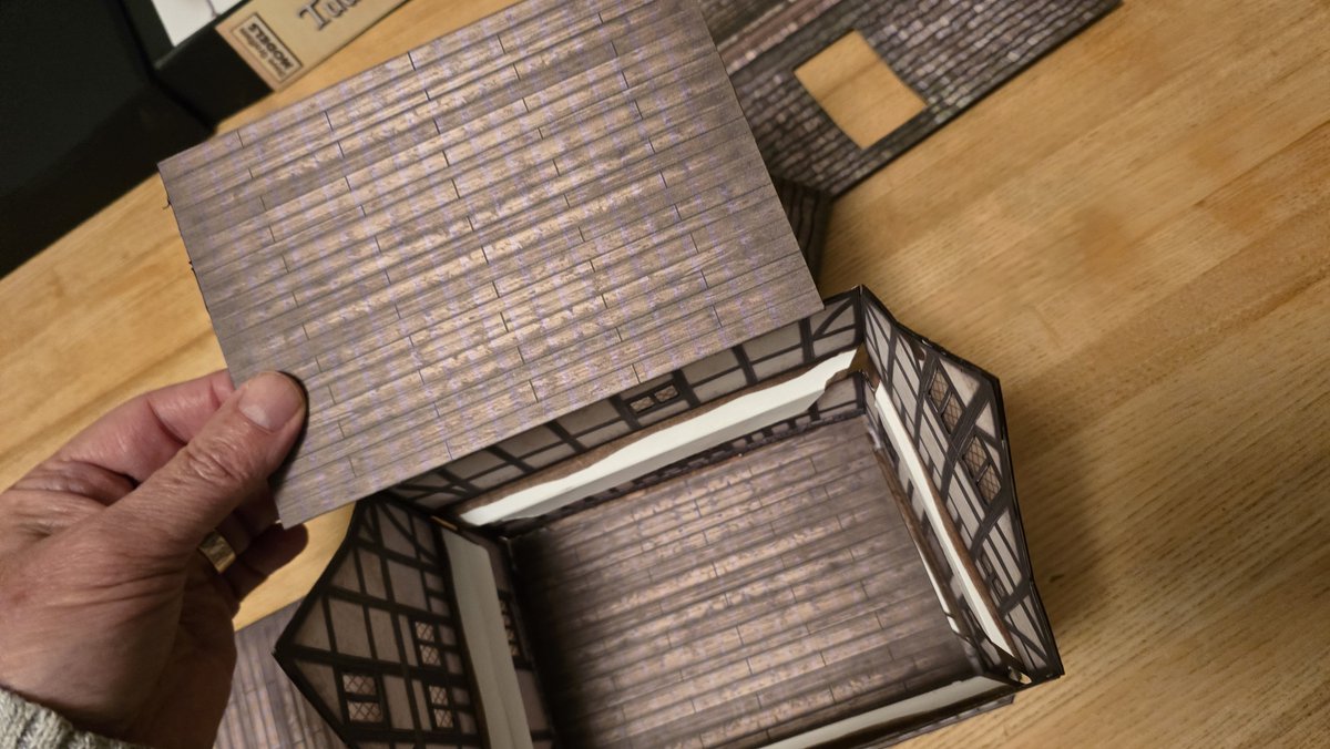 I've come out of papercraft retirement! :-)
Here's some photos of my fold-flat, playable interior version of <a href="/DaveGraffam/">Dave Graffam</a>'s Tudor House #4