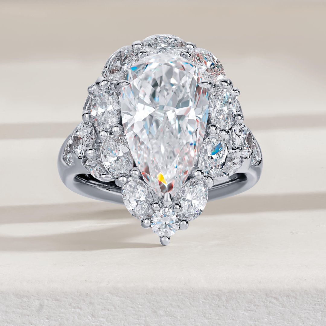 JewelsByStar's tweet photo. Shine like never before with JB Star! Our beautiful diamond ring features a magnificent pear-shaped diamond, crowned by oval and marquise diamonds. (Style 3519-005)
.
.
#jbstar #jewelsbystar #weddingring #highendjewelry #luxurylifestyle #diamondjewelry #platinum #centurionjewelry https://t.co/j4esW3khmM