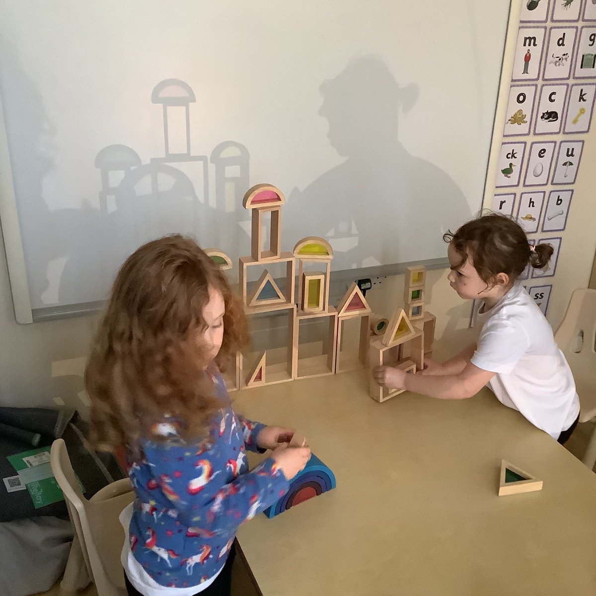 eshceprimary's tweet photo. Today in Class 1, Reception children have been experimenting with light, shadows, silhouettes and colours by constructing with different shaped architect blocks and coloured blocks. We used our new Early Years Projector from @TTSResources https://t.co/efCQXn6YPC