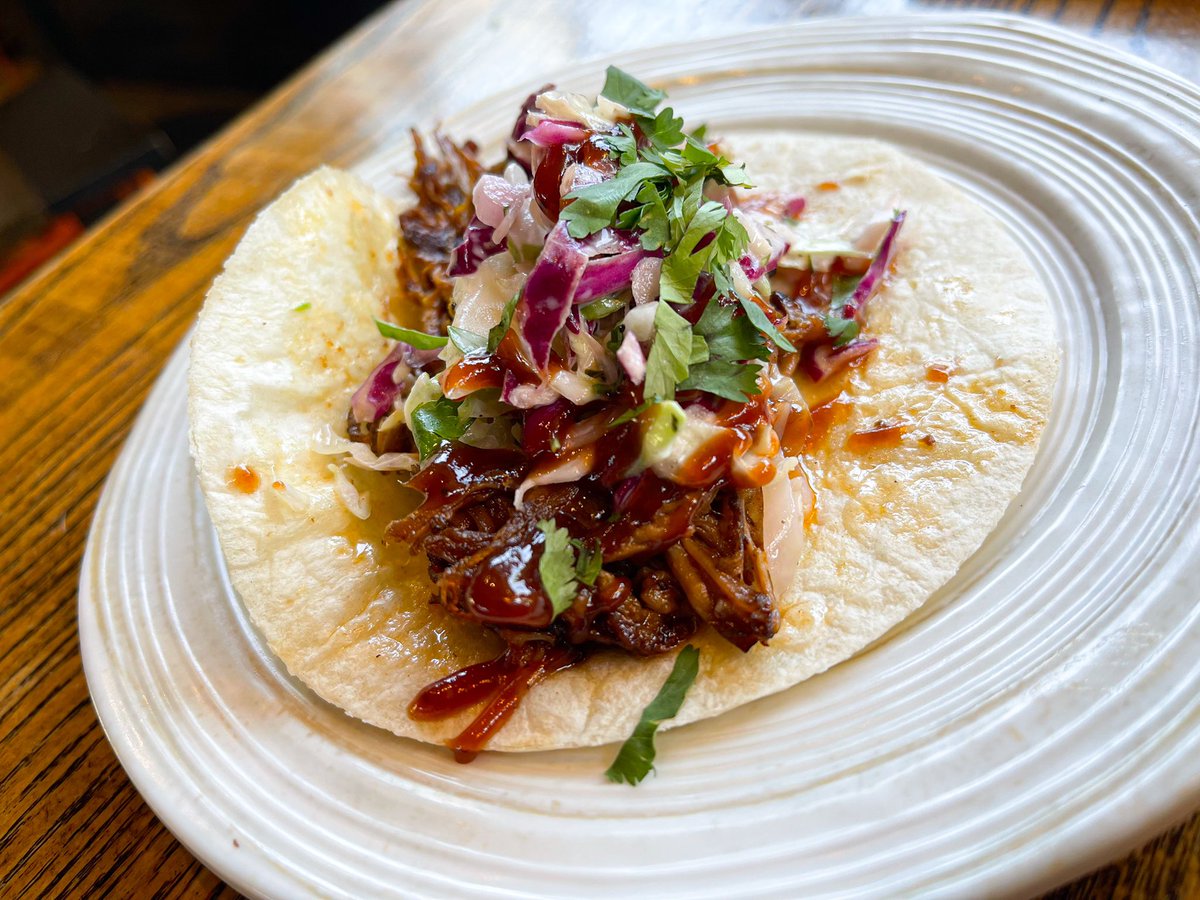 Even with the sun shining, it’s a bit cold to fire up the ole barbecue so we’ll just grab a plate of brisket tacos today for our backyard bbq fix! 😎🥩🌮🔥

Texas Hold ‘em Brisket :: Eva &amp; Maddie’s creation, BBQ brisket, coleslaw, cilantro, crema.