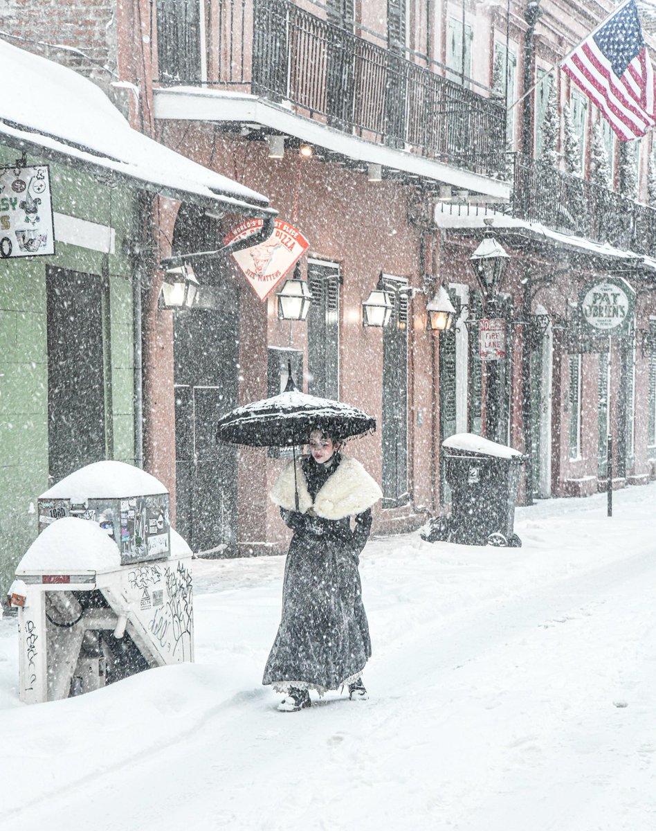 Elegant snow umbrella, St Peter street, New Orleans