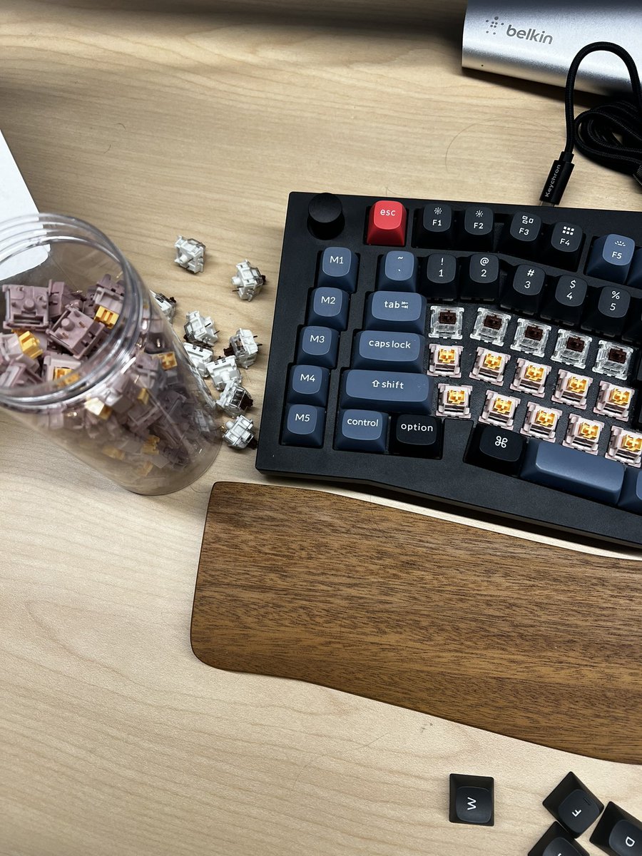 0xdmitron's tweet photo. I feel like keyboard people who don’t use an Alice or some other ergonomic keyboard layout have either A) not tried one or B) tried one but didn’t use it long enough to get used to it. I can’t use a standard keyboard anymore without hands aching. 

pic is me swapping out switches for my keychron q10