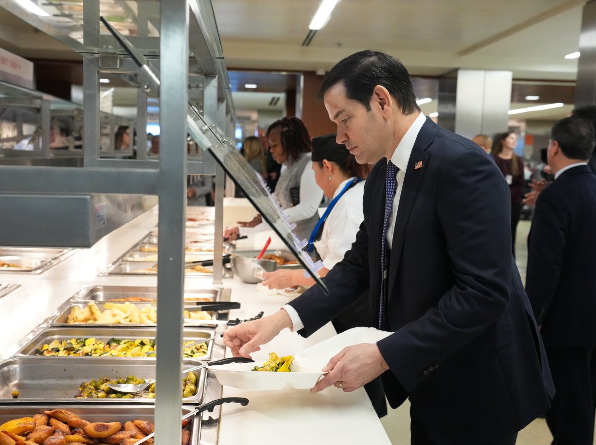 SecRubio's tweet photo. My first week wouldn’t be complete without a trip to the Department's cafeteria — I can see why it's one of the best in the government! Jeanette and I enjoyed meeting more members of the @StateDept team, even if some are Commanders fans — go Dolphins! Looking forward to the work we will do together.