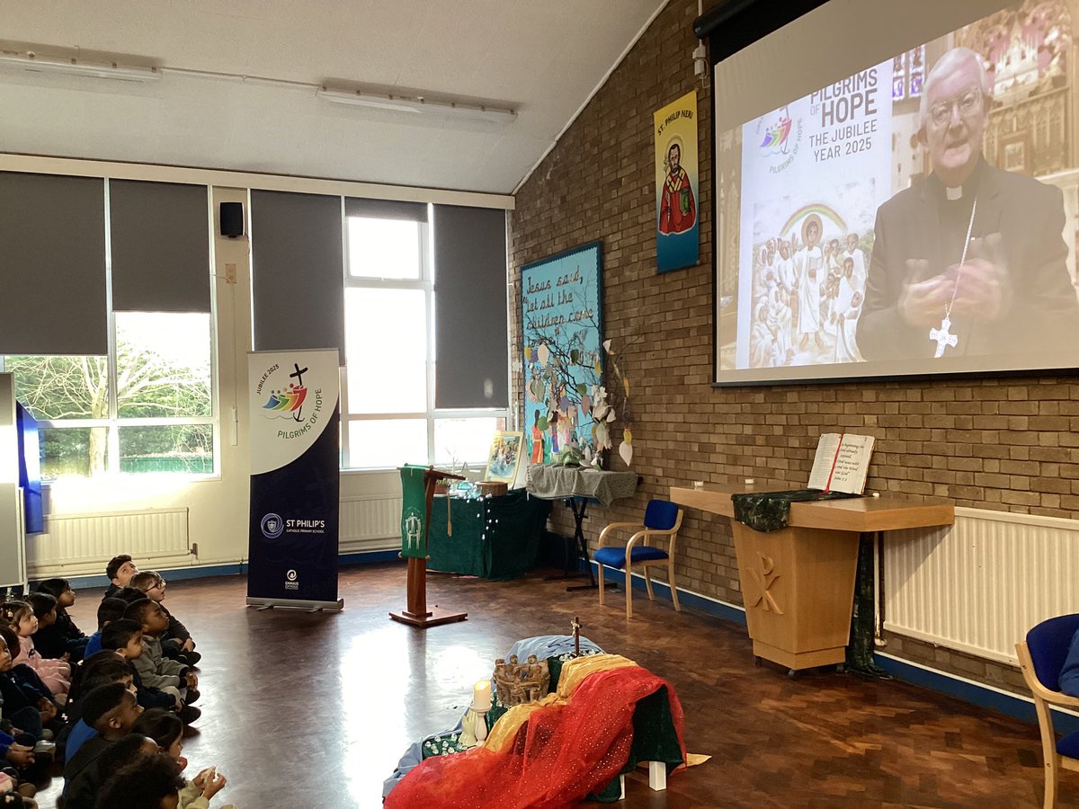 STP_School's tweet photo. We have all come together to celebrate the launch of the Jubilee Year Pilgrims of Hope 🕯️❤️💙💛💚 #bhamdes #catholiclife #jubileeyear #collectiveworship #pilgrimsofhope https://t.co/6G6yM5KzwA