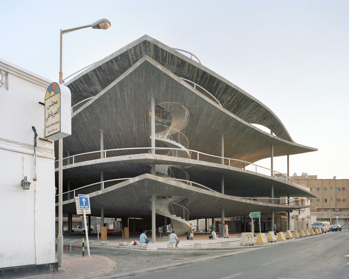 ArchDaily's tweet photo. The "Four Car Parks" project in #Muharraq's Old City Center, integrates sculptural, sloping slabs and exposed structural elements to create a dynamic, multifunctional public space. https://t.co/nW3E4YmMaB https://t.co/IViUMovn4r