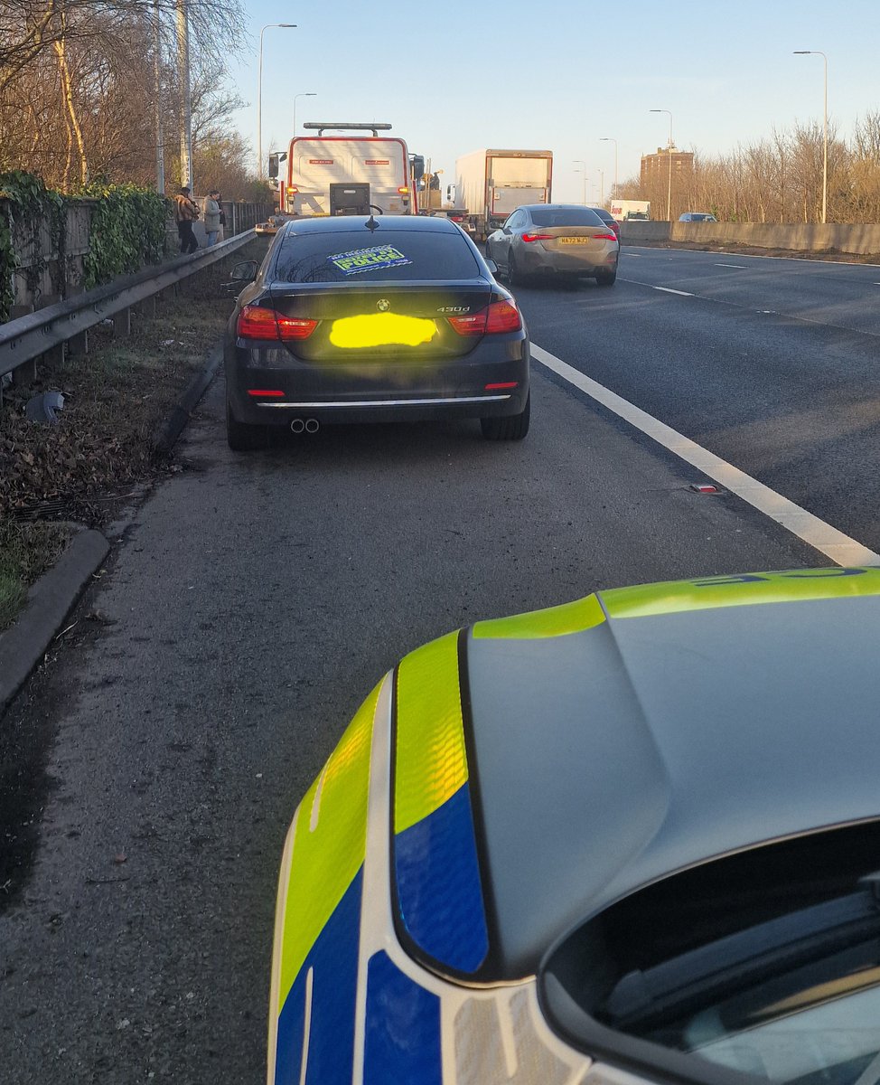 In 1 !  BMW Lane hogging on M60,
In 2 !! Driver of BMW using a mobile phone,
In 3 !!! No Insurance on said BMW, 
And for Bully's Special Prize, Driver won 12 points, plus car seized #OPWOLVERINE
(Sorry if you don't get the reference we are mostly golden oldies in Traffic)