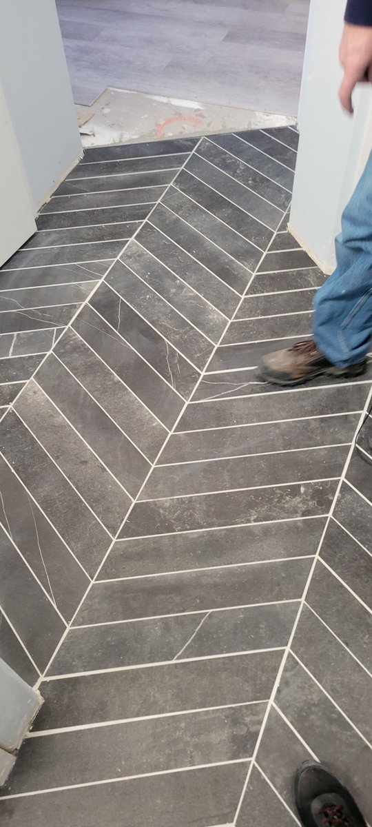 filthy_masters's tweet photo. Post-flood rebuild progress: chevron tile is in! Just need to add the vanity, toilet, and baseboards to finish the job. Restoring homes, one step at a time. #FloodRestoration #HomeRebuild #ChevronTile https://t.co/l6VrF7QdpJ