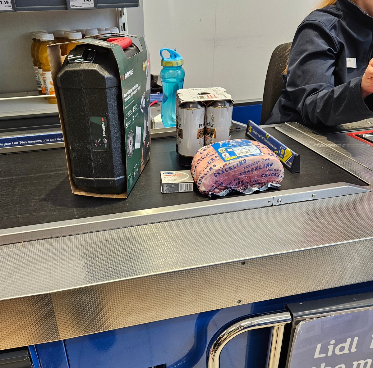 The person in front of me's shopping <a href="/LidlGB/">@LidlGB</a> - a pork joint, some beers, some painkillers, and an impact wrench. You really couldn't ask for more from your local supermarket 👍