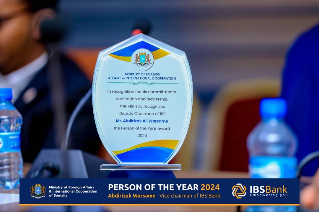 AmbGuure's tweet photo. The Ministry of Foreign Affairs and International Cooperation has recognized Deputy Chairman of IBS Bank Abdirizak Ali Warsame the Person of the Year. The Permanent Secretary of MFA, Hamze Adan Hadow, presented the award of Honor to Chairman of  IBS Bank Abdirizak Ali Warsame https://t.co/TN9R6fTaaY