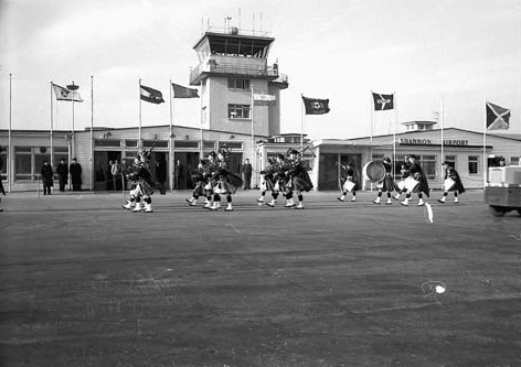 Glucksman Spec Coll (@ul_speccoll) on Twitter photo #HappyStPatricksDay! Here are piper players celebrating at Shannon Airport in 1959. These photos are taken from the #ShannonDevelopment collection, which is being catalogued as part of the <a href="/wellcometrust/">Wellcome</a> funded New Jerusalems project. #NewTownArchives <a href="/ULLibrary/">Glucksman Library</a> <a href="/ShannonAirport/">Shannon Airport</a> #HappyStPatricksDay! Here are piper players celebrating at Shannon Airport in 1959. These photos are taken from the #ShannonDevelopment collection, which is being catalogued as part of the <a href="/wellcometrust/">Wellcome</a> funded New Jerusalems project. #NewTownArchives <a href="/ULLibrary/">Glucksman Library</a> <a href="/ShannonAirport/">Shannon Airport</a>