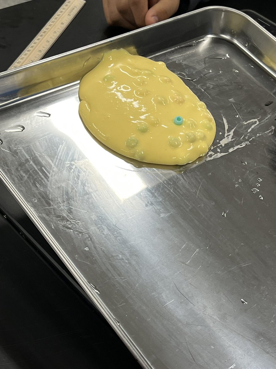 Earth Systems designing their own experiments to study the factors that affect the flow rate of glaciers.