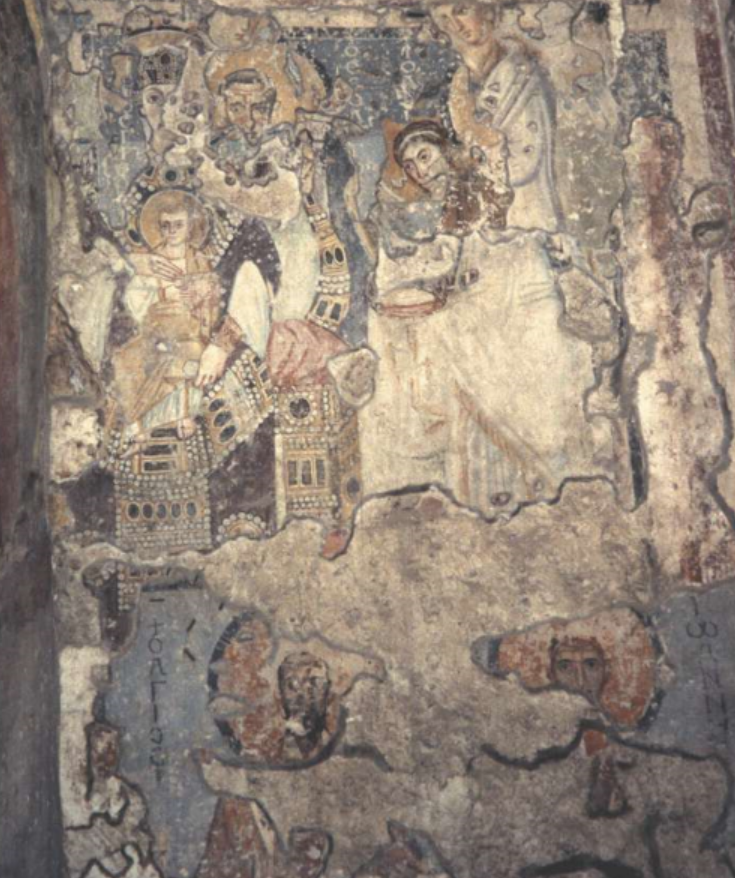 Alyunan00's tweet photo. When Rome spoke Greek...

Two unique frescoes from Santa Maria Antiqua, Rome, from the 7th century, during the peak of 'Byzantine Papacy' era.

On the left Saint Anna (Η ΑΓΙΑ ΑΝΝΑ) holding Mary and on the right a palimpsest wall, with different layers of frescoes from that era with Mary and several Greek Church Fathers (e.g. Ioannes Chyrostom).

It's interesting to quote an interesting passage from 'Rome in the eighth century : a history in art / John Osborne, The British School at Rome, Cambridge University Press, 2020'.

"Perhaps not surprisingly, Rome in 700 was very much a bilingual city. It was not a case of Latin or Greek, of separate communities which may have had little  or no interaction, but rather one of Latin and Greek,  of a clergy and élite laity that was comfortable in both languages, although the  communities of immigrant monks perhaps somewhat less so.  Even if Latin remained the official language of the Roman church, Greek was the  common tongue employed by many members of the senior clergy, and the vast  majority of the popes between 685 and 750. A telling insight into the nature of  the papal court in the time of Pope John VI (701–5) is provided by Stephanus  in his biography of Wilfrid, the  Anglo-Saxon cleric and abbot of Hexham and Ripon. Wilfrid had journeyed to Rome  in order to appeal the decision of the Council of Austerfield (702) to remove  him as Bishop of York, and Stephanus comments that John and his clergy spoke  Latin to the visitors but conversed among themselves in Greek: ‘inter se graecizantes et  subridentes’.  Clearly the pope and his colleagues could function effectively in both  languages, but, at least on this occasion, spoke Greek among themselves. It was  this dual language proclivity with strong Greek roots that characterized Roman  identity in 700. It permeated literary culture well into the early ninth  century; and, as we shall see, this is further reflected in  the legacy of the city’s material culture, for  example, in the inscriptions, both painted and carved, which were placed in the  church of Santa Maria Antiqua. The Greek language also lies at the heart of the formal development of papal ceremonial in the  years around 700, with many of the words used in the Ordo  Romanus I, the official protocol for papal processions and services  during Easter week, constituting simple transliterations of Greek terms and  phrases. In their apparent obsession with the privileges  accorded to various offices and ranks, the Ordines  Romani also make extensive use of  military terminology, indicating what John Romano has described as a blurring of  the boundaries between the army and the church."