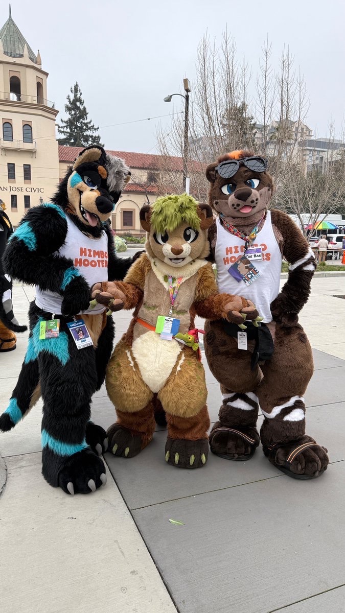 #fursuitfriday Myself and himbro <a href="/Kayne_Ein/">Kayne Ein/Koi (kayne-ein.bsky.social) ➡ LVFC | AC</a> bullying this cute lil otter <a href="/meowznstuff/">Catboy Malewife 🔜 FC 25’</a> at FC 😎