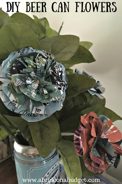 It's National Beer Can Appreciation Day.

If you really appreciate them and see them as treasure, not trash, you need to make our DIY Beer Can Flowers: abrideonabudget.com/2018/02/diy-be…

They're the perfect centerpiece if you're having your wedding or rehearsal dinner at a brewery.