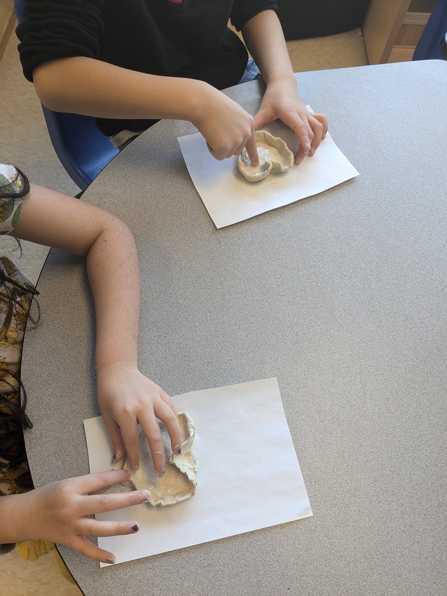 Mrs_Hall7's tweet photo. Creative minds at work! 🎨✨ Our @StGabrielOCSB grade 2 artists are shaping their imagination with air dry clay to make beautiful bowls and trinket holders. Next week we will paint them! #Grade2Art https://t.co/4c3MYOGcAm