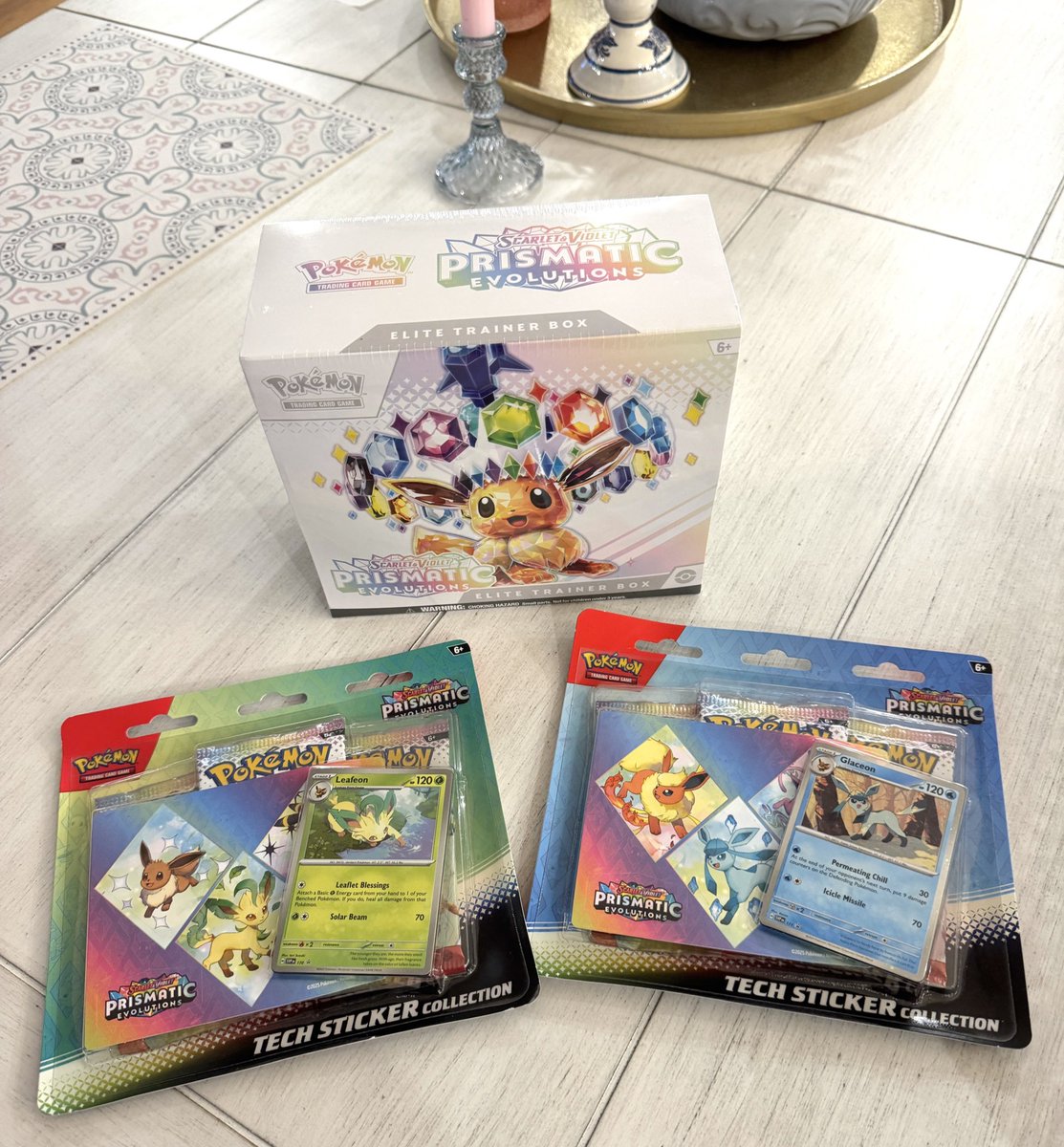 FennecFox2012's tweet photo. Well, my wife was able to beat some scalpers and snagged a few prismatic evolutions items for our son! I mean, I kinda get into it too. But he loves it! 

#PrismaticEvolutions #PokemonTCG https://t.co/c15TFUiWYB