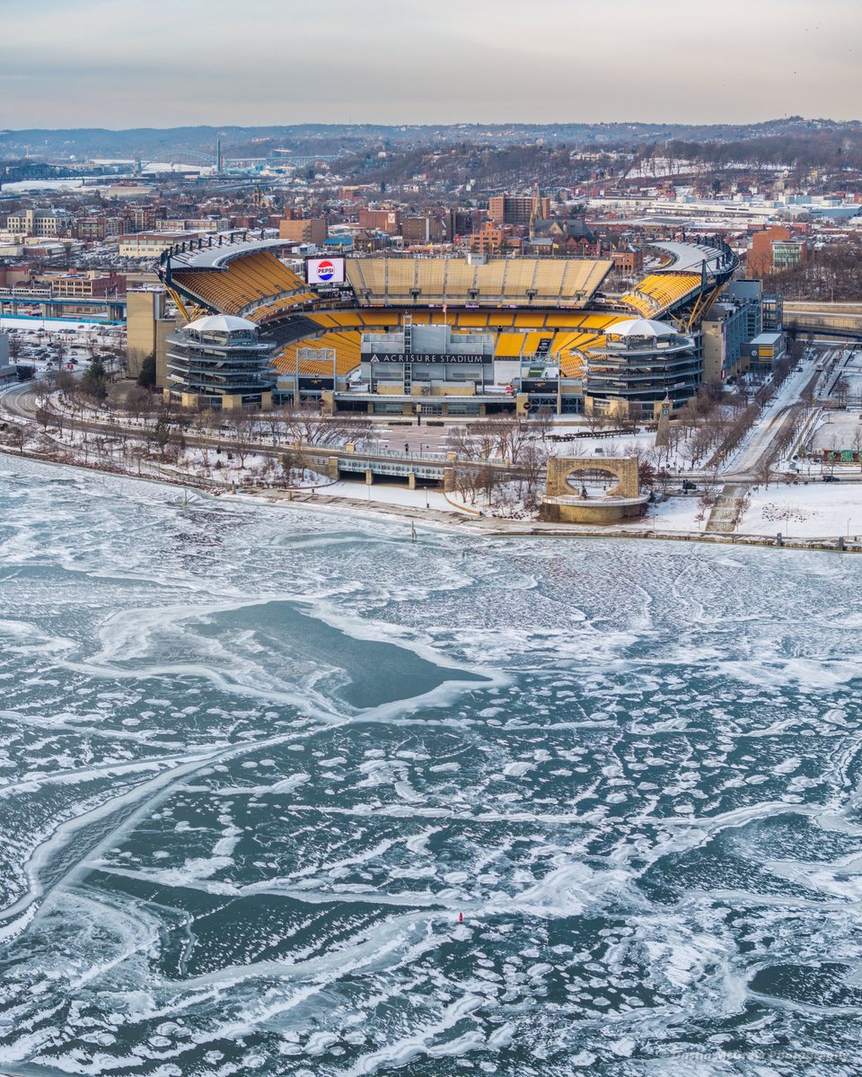 Another icy view from #Pittsburgh looking across the completely frozen over Allegheny River towards Acrisure Stadium.