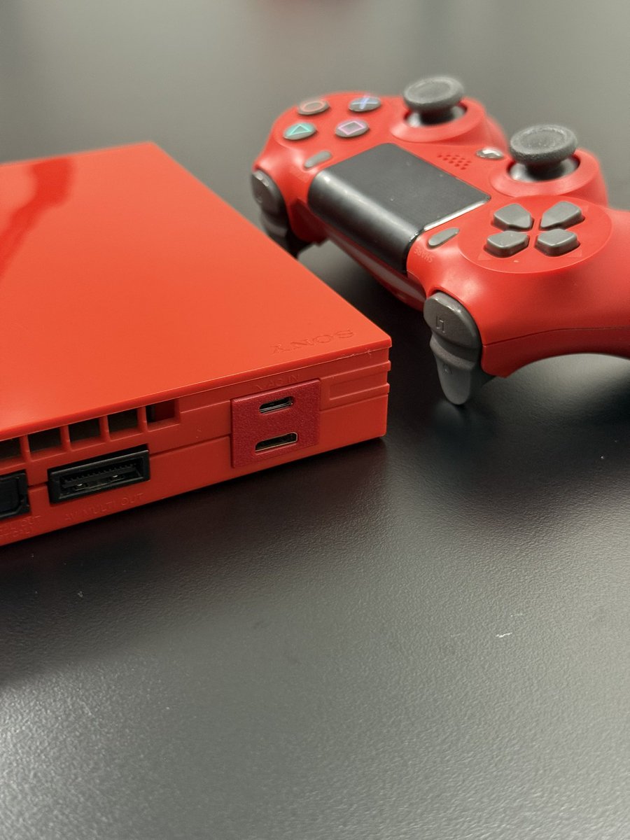 RetroCraftCo's tweet photo. We teased it. And here it is. Obvious inspiration from @Gusse__ and learnings from @modzvilleusa and @Voultar 

I tried to build the ultimate PS2. 

Genuine Sony PS2 Red ‘Cinnabar’
Fitted with a Modbo for region free disc loading and the @PixelFXco GEM Shiney.  Powered by USBC PD https://t.co/IkNt4Gzr4Z