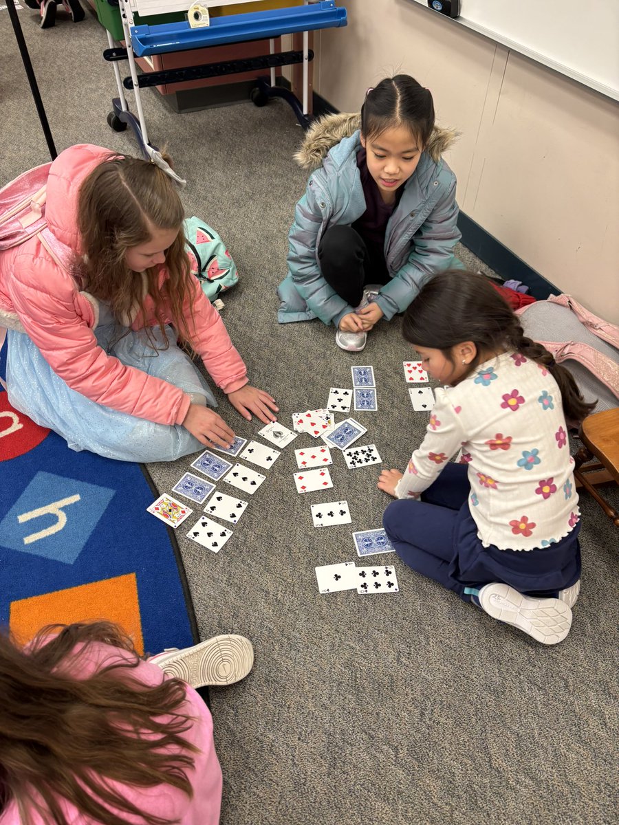 Our fifth grade buddies taught us some new card games today and modeled good sportsmanship, turn taking and following directions. What a special group of young boys and girls!