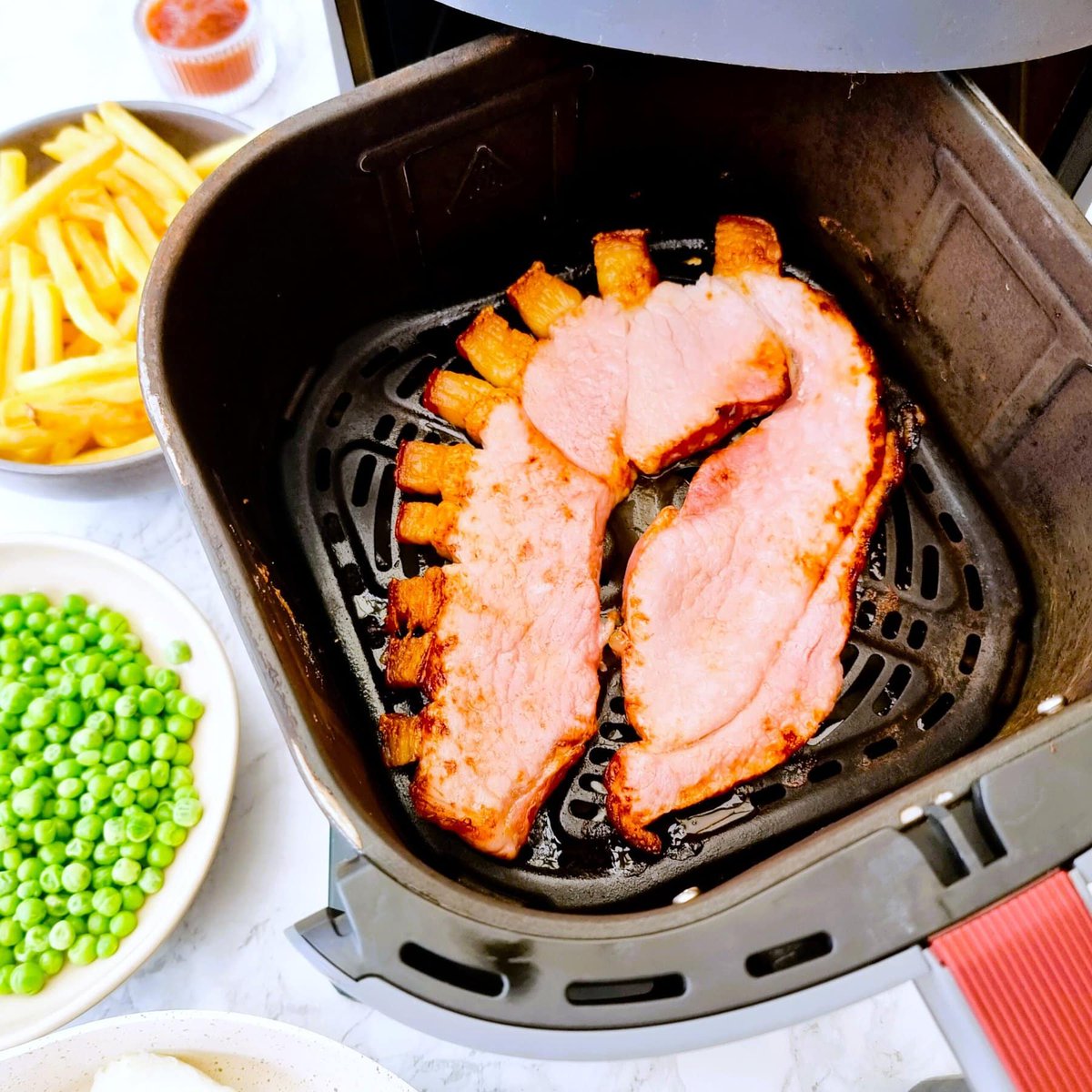 Learn how to How to Air Fry Gammon Steaks with these simple instructions. This British pub classic dish is incredibly easy to cook at home and the air fryer ensures that the gammon is perfectly cooked with golden crispy fat. The only question is if you'... feastgloriousfeast.com/air-fry-gammon…