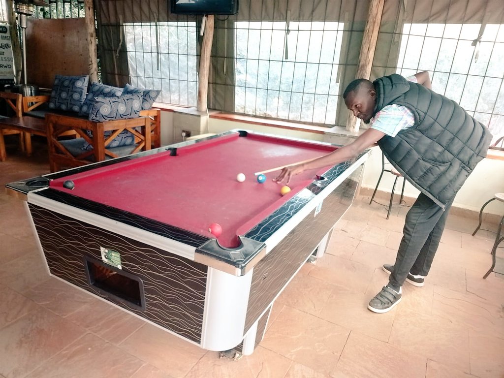 ReubenWillies's tweet photo. Enjoying a cup of the finest coffee while playing pool at Sirwo coffee club @GroupSirwo, the premier resort in Trans Nzoia County. ☕️ Had a fantastic farm tour with the knowledgeable Manager, Mr. Manyali." Great times 🔥. Sirw https://t.co/liJLyVdXaC