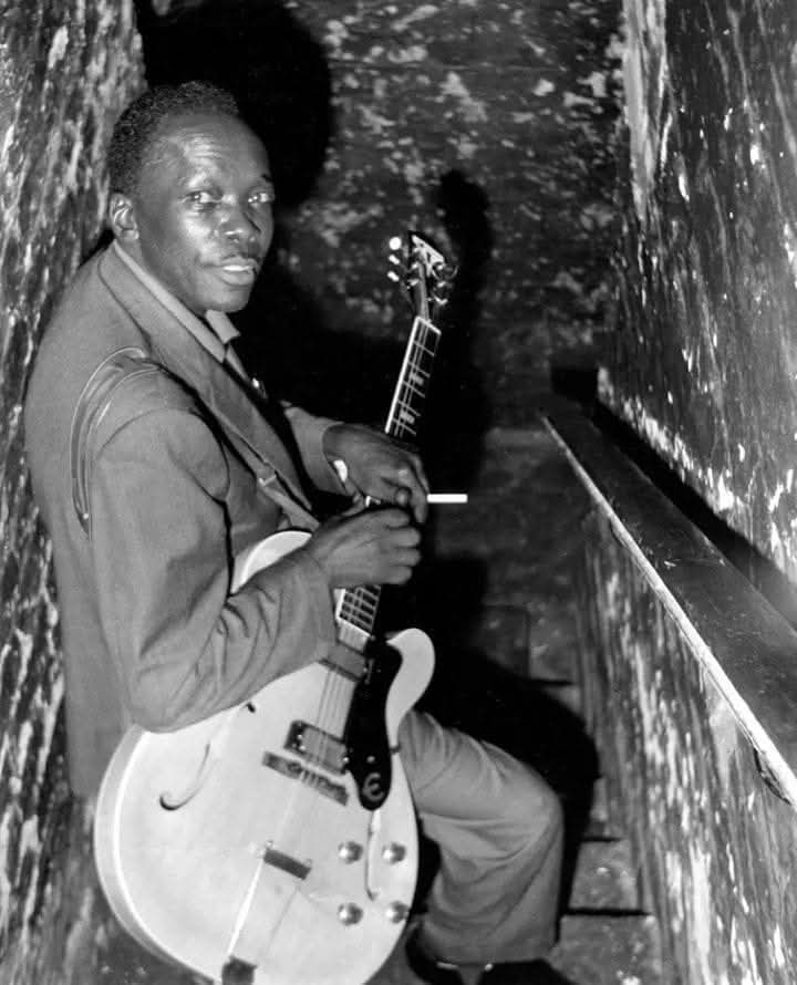 John Lee hooker getting ready to go on stage at Manchester's twisted wheel 1964.