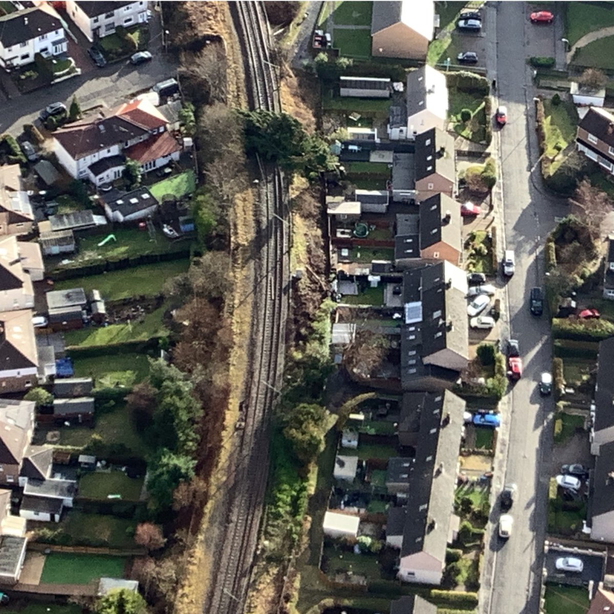 NetworkRailSCOT's tweet photo. 🟢 #StormÉowyn. Our helicopter is currently inspecting tracks from Hyndland to Helensburgh/Balloch/Milngavie.

Unfortunately, they’ve spotted numerous fallen trees. We’re also dealing with fallen trees and overhead wire damage near Dalmuir.

@networkrail @transcotland @ScotRail https://t.co/Hz2rIQEi6F