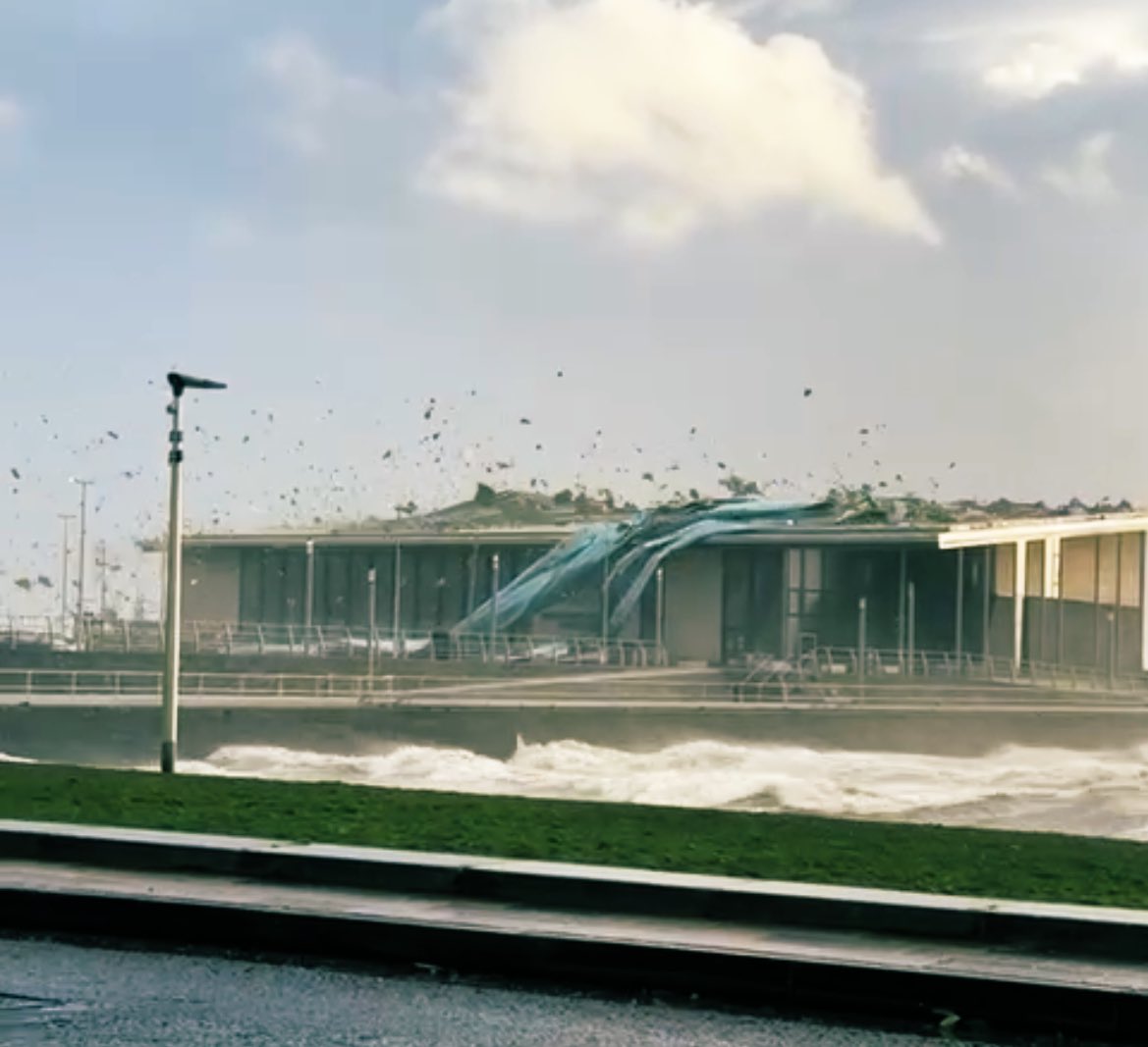 AmandaHampsey's tweet photo. Helensburgh Waterfront Leisure Centre

The Storm has caused significant damage to the roof with debris blown across a wide area. Contractors and council officers have been on site since yesterday evening to progress the clear up operation. West Clyde Street had been closed for the safety of the public, but debris has been cleared sufficiently to allow it to re-open safely. Work continues to assess damage to the centre, and immediate and longer term actions required. 
Helensburgh car park and access to the pier is closed as a public safety measure given the damage to Helensburgh Leisure Centre. Owners of cars parked in the car park are encouraged to remove their vehicles as soon as possible. The Council will support access, during daylight hours.