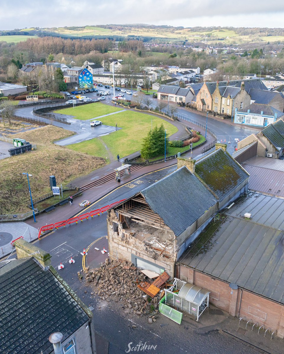 scotdrone's tweet image. The aftermath of Storm Eowyn on Denny in the Falkirk area with severe damage to the CO-OP Supermarket on Stirling Street in the town centre. #denny #falkirk #scotland #storm #StormEowyn